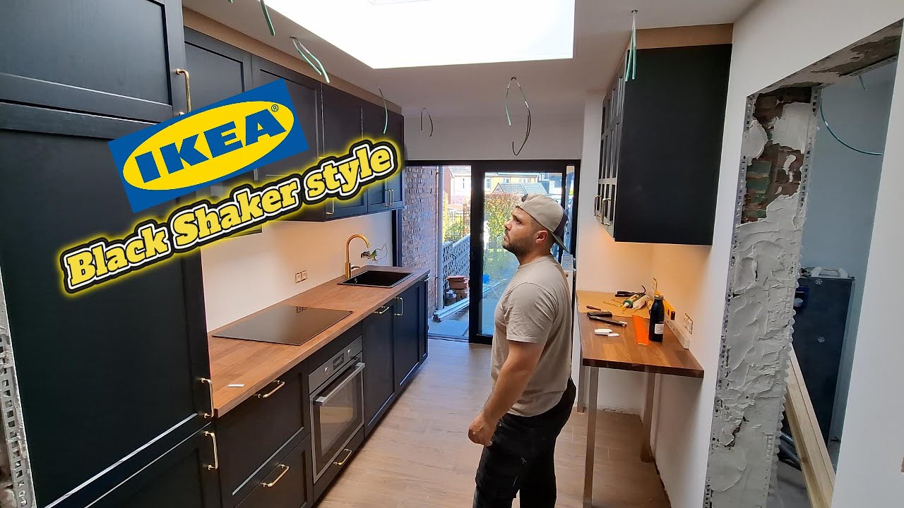 IKEA Black Kitchen with a small eating bar 37