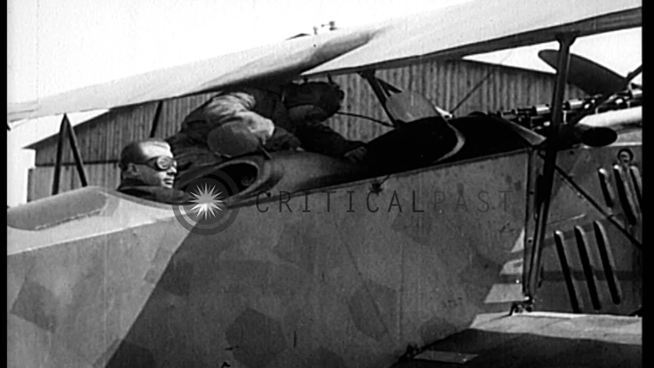 German World War 1 ace, Ernst Udet, gives passengers rides in a German Fokker D.V...HD Stock Footage
