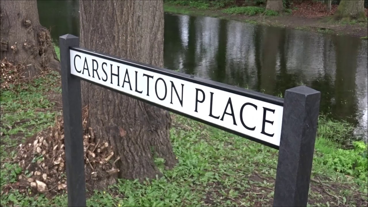CARSHALTON PARK AND GROVE PARK WITH WATER IN  CHANNELS