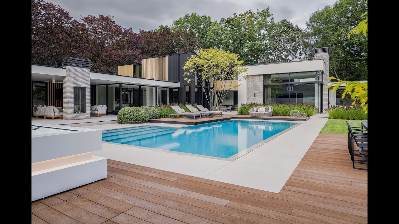 Exclusieve design villa met wellness tuin - strak overloopbad en jacuzzi | VSB Wellness #pooldesign