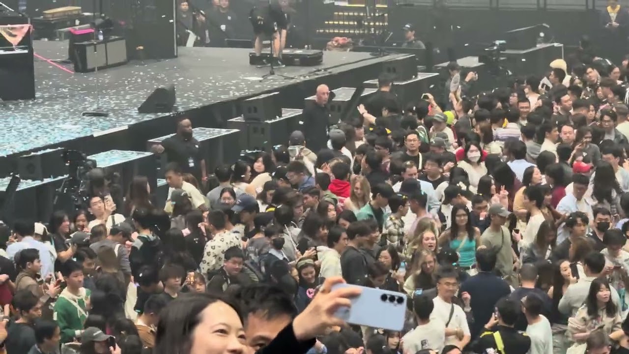 fans staying & taking photos 