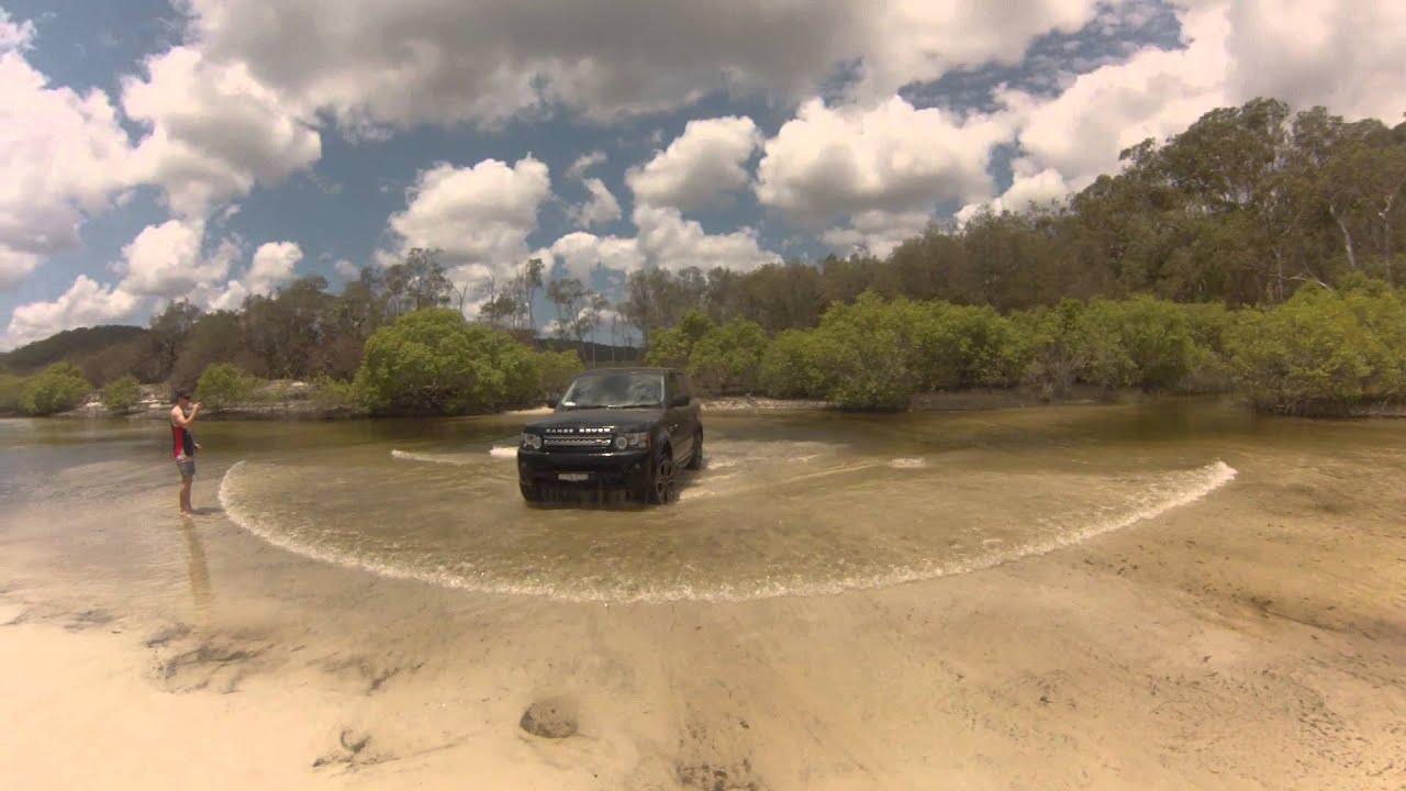 fraser island awinya creek crossing in range rover