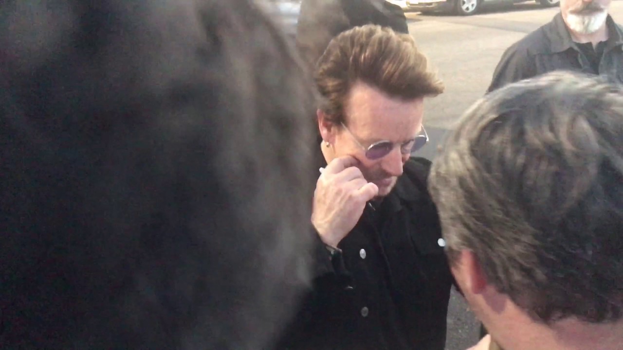 Bono signing my arm and meeting Joshua Bear