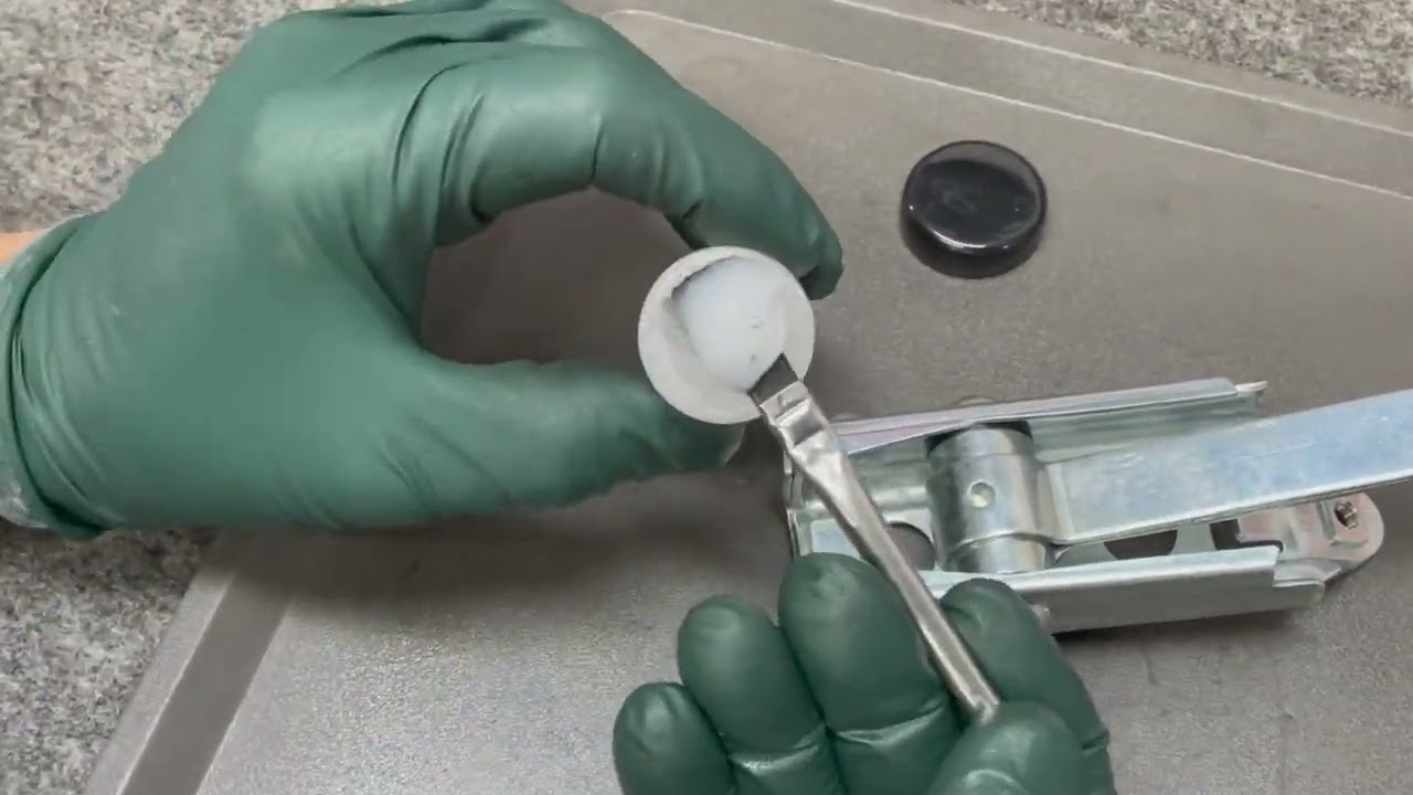 Lubricating a 1965 to 1995 Mercedes Door Check Strap