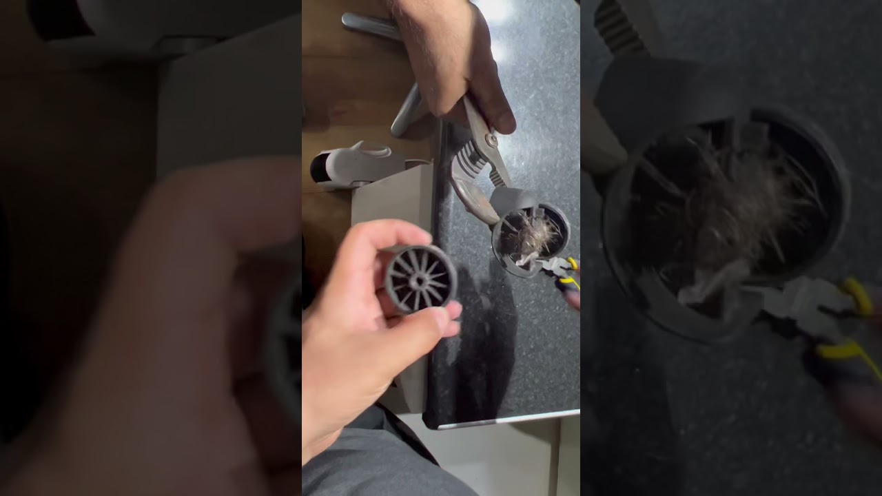 We managed to open the trolley wheels and removed the hairs.