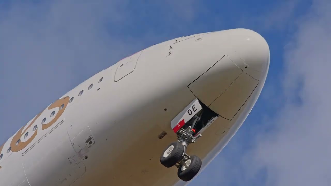 Zurich Airport Emirates airplane Airbus A380-800 A6-EOE landing on a sunny winter day.