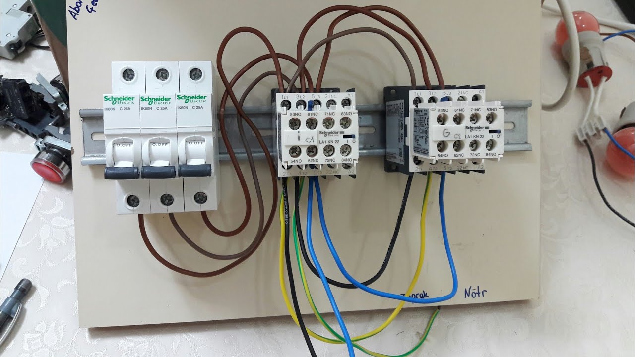 3 fazlı asenkron motorun elektriksel kilitlemeli devir yönü değiştirme güç devresi