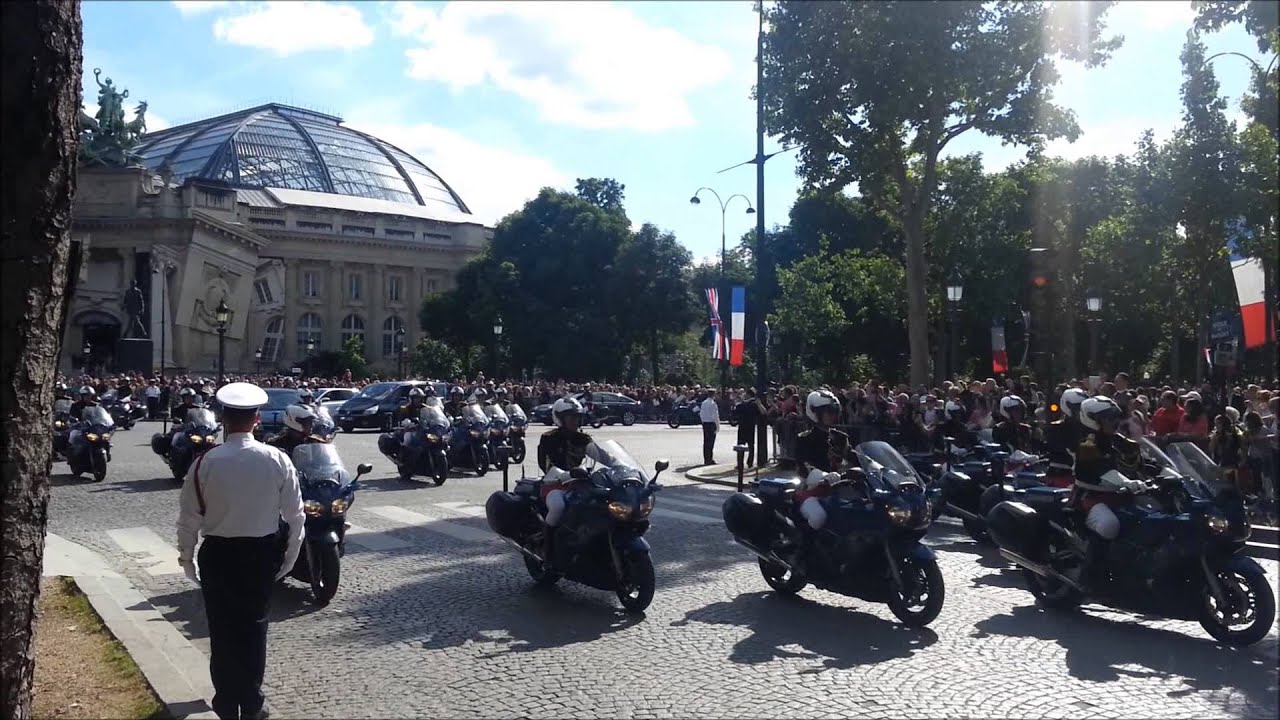 Historic Moment: Queen Elizabeth II's Convoy Through Paris