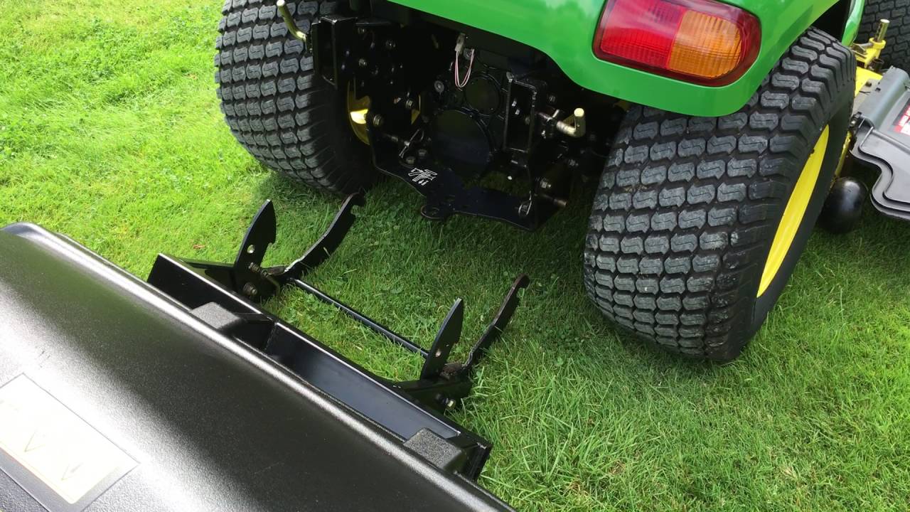 John Deere X740 removal of grass collection system 2