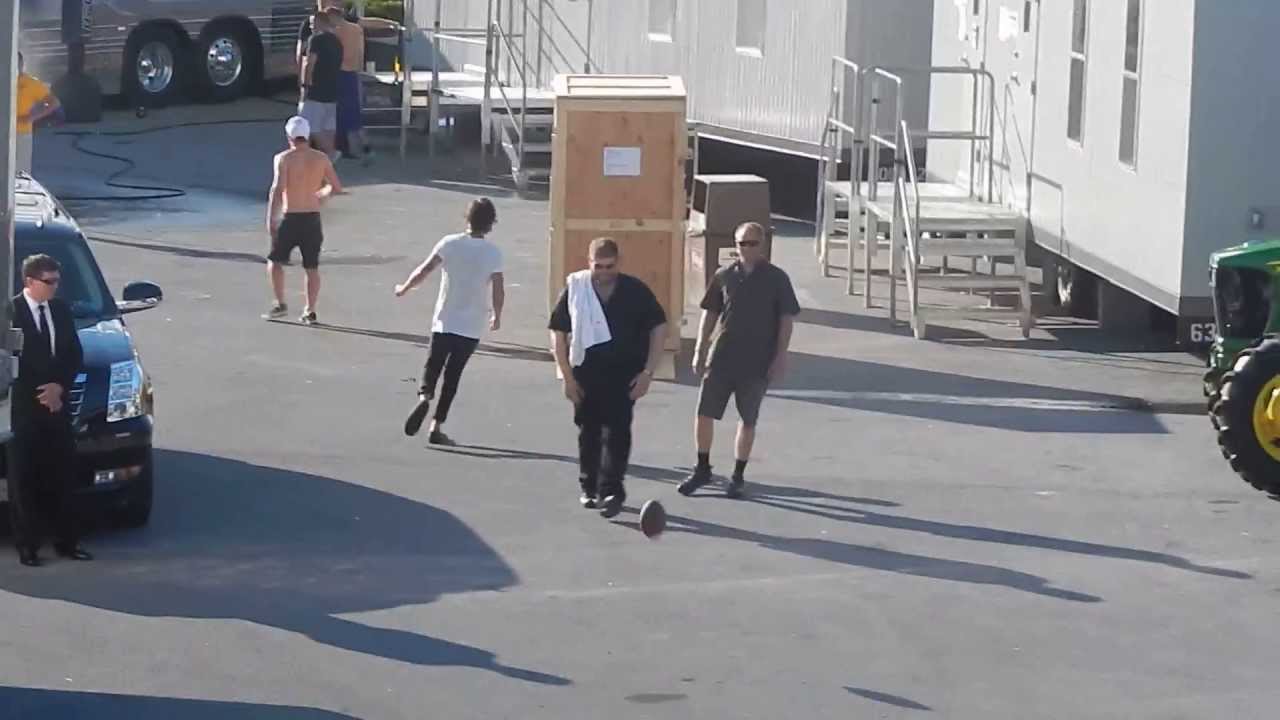Harry and Niall playing football- Hershey Park 7.06