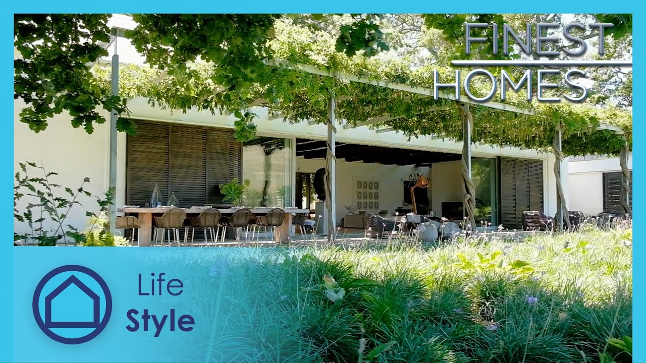 Home backdropping the French Mountains | Finest Homes 405 | Life+Style