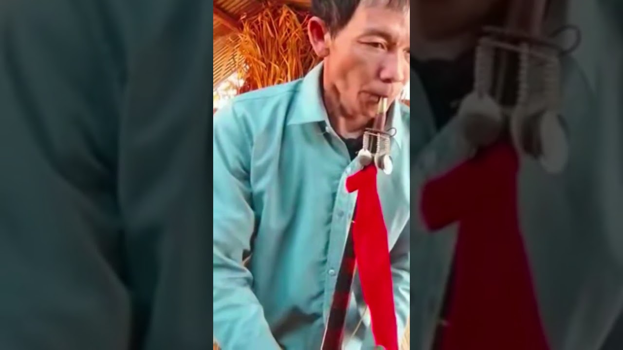 Qeej nuj nrws tus tshuab vam tswb thoj los yog vaj pov thoj