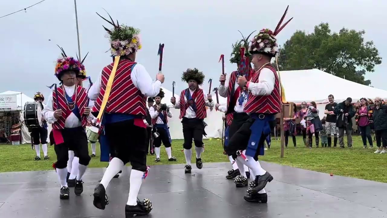 Saddleworth Morris Men dance on the site arena