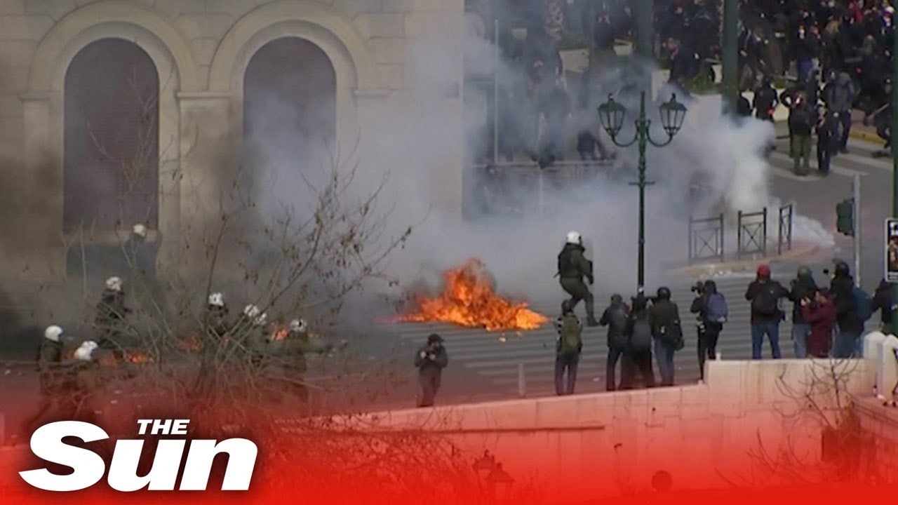 Riot police use tear gas on protesters in violent clash over train crash in Greece