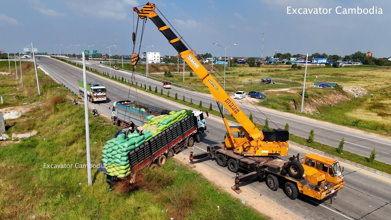 Dump Truck Delivery Rice Accident Back Drive On Highway Recovery By Crane - Dump Truck Fail On Road