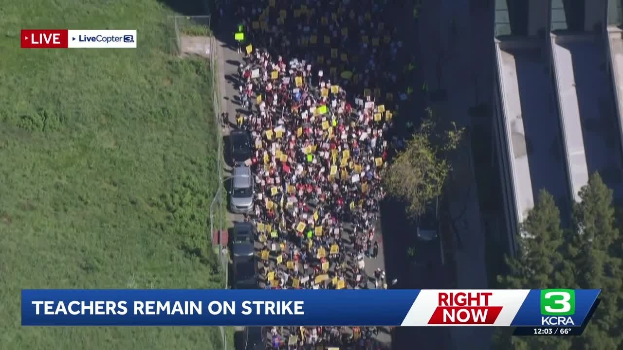 Natomas and Twin Rivers teachers unite for strike march in Sacramento, march across Tower Bridge
