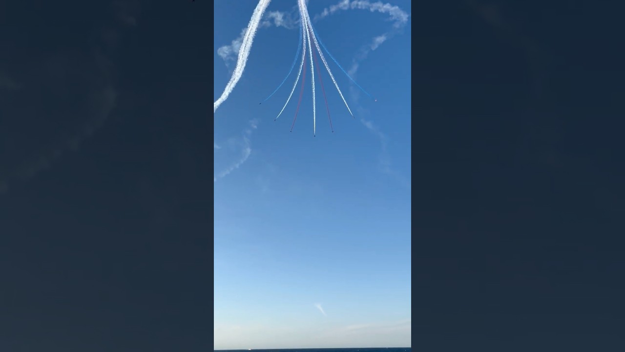 RAF Royal Airforce Red Arrows display team smoke on vertical break in the blue sky of Malta Airshow