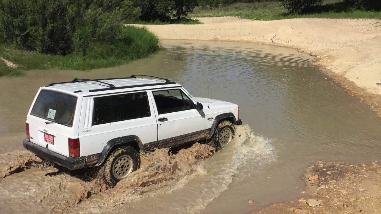 Stock Jeep Cherokee XJ at Hidden Falls Advernture Park OFF ROAD - central Texas Camping Trip