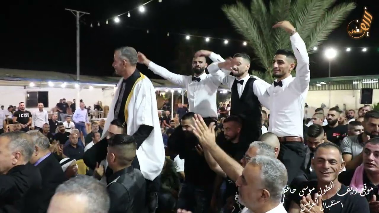 استقبال العريس حفلة ابناء المرحوم ابو العبد الحوراني والد العريس ابو قاسم الشاعران موسى حافظ وجهاد