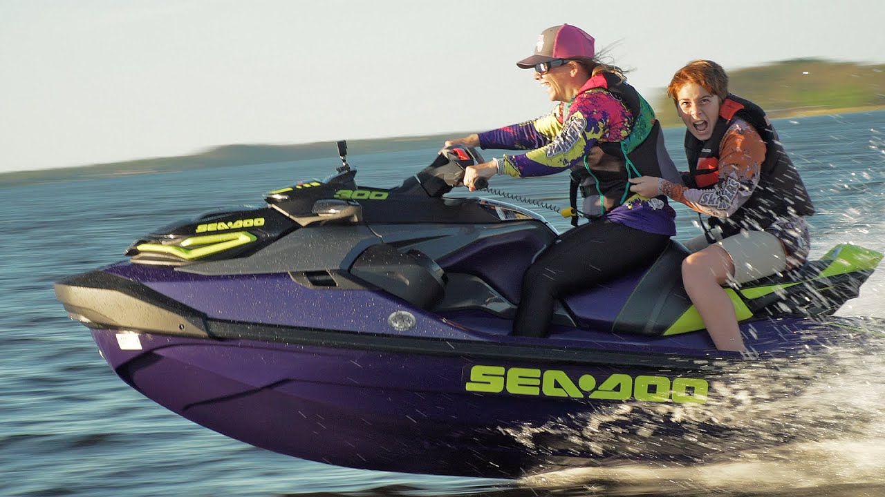 Surprised wife with 2021 Supercharged Sea-Doo RXTX 300