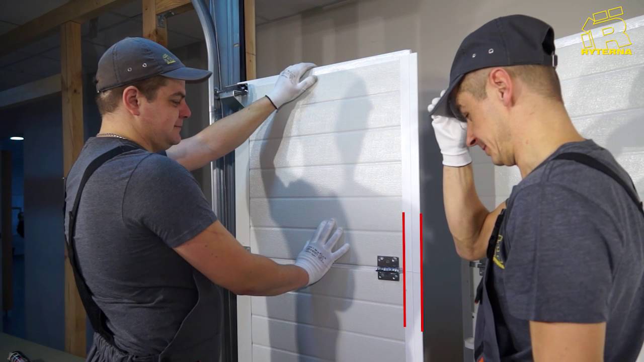 Damaged panel replacement on sectional door with wicket