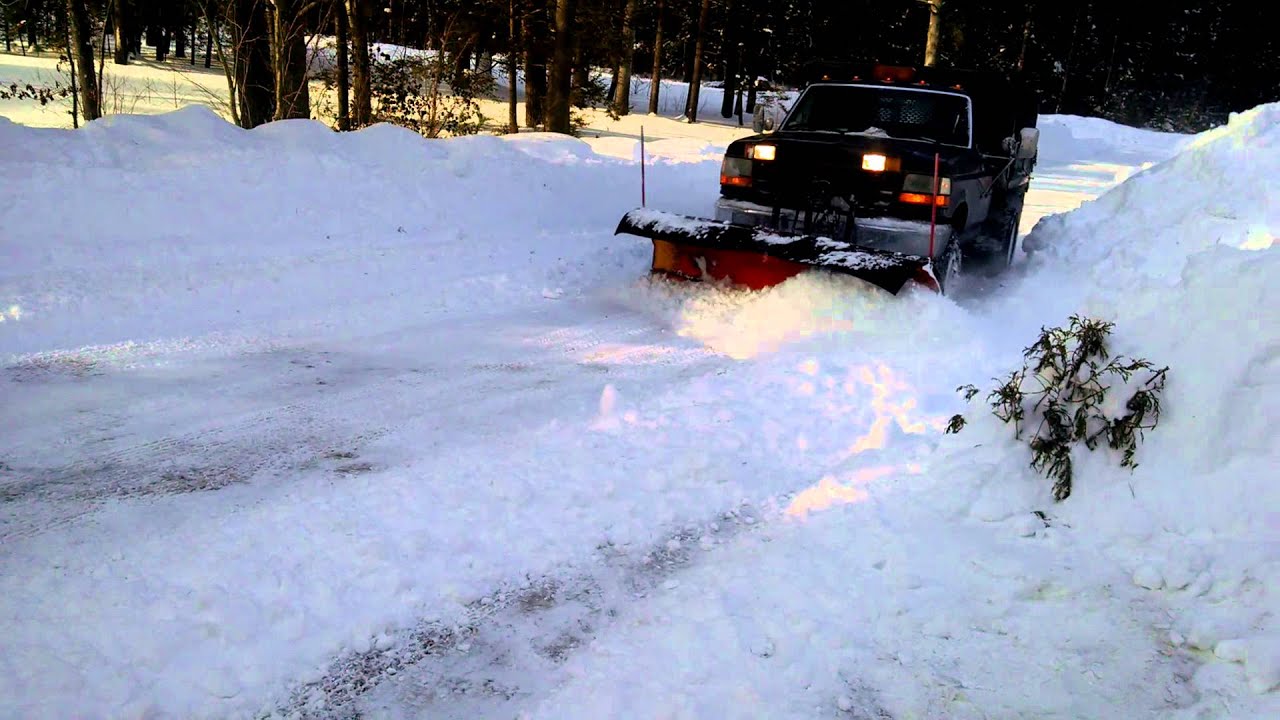 Dump truck plowing