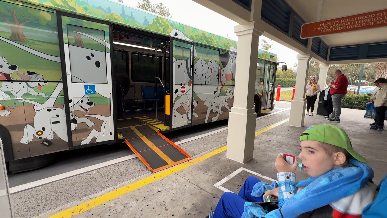 Kayden off 101 Dalmatians Bus at Disney’s Caribbean Beach Resort! #bus #busstop #disneyresort