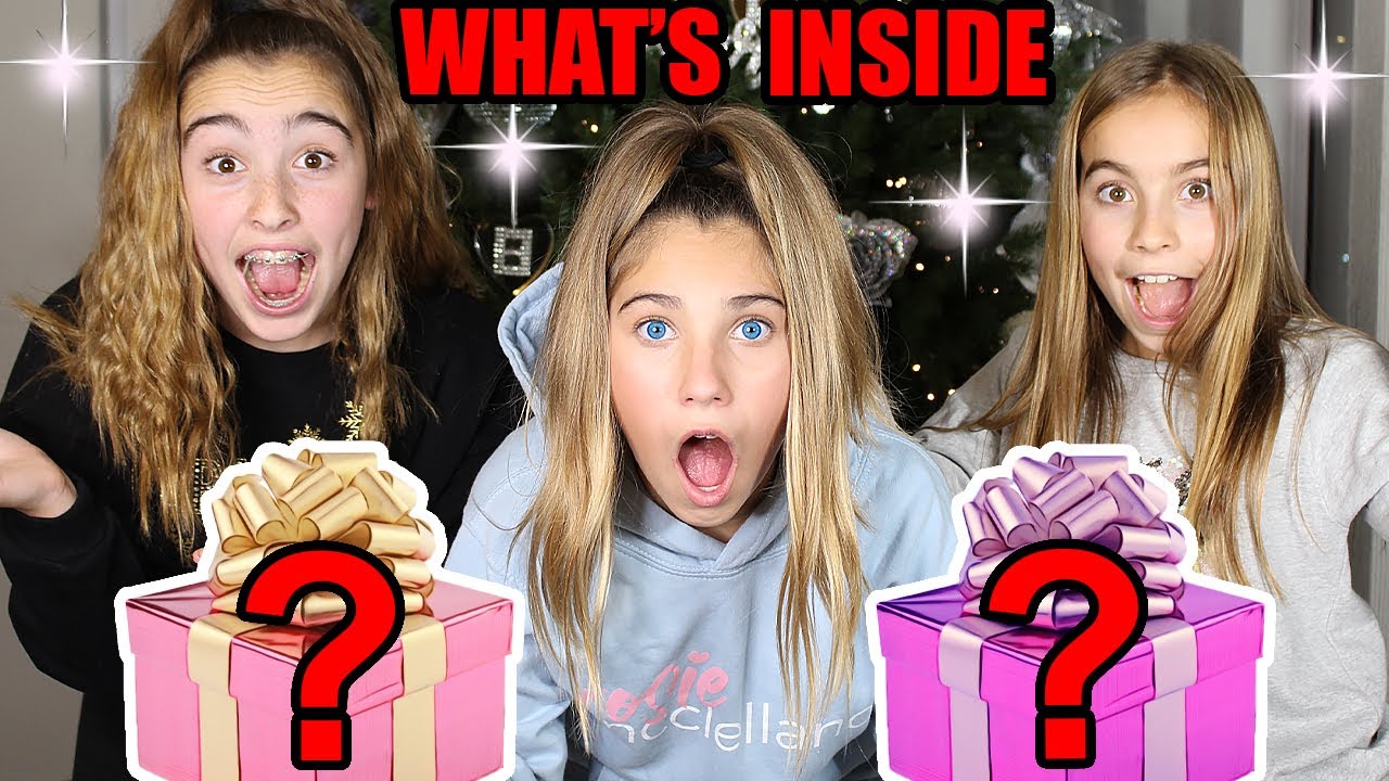Guess WHAT'S INSIDE Present Opening Challenge | Secret Santa | Rosie McClelland