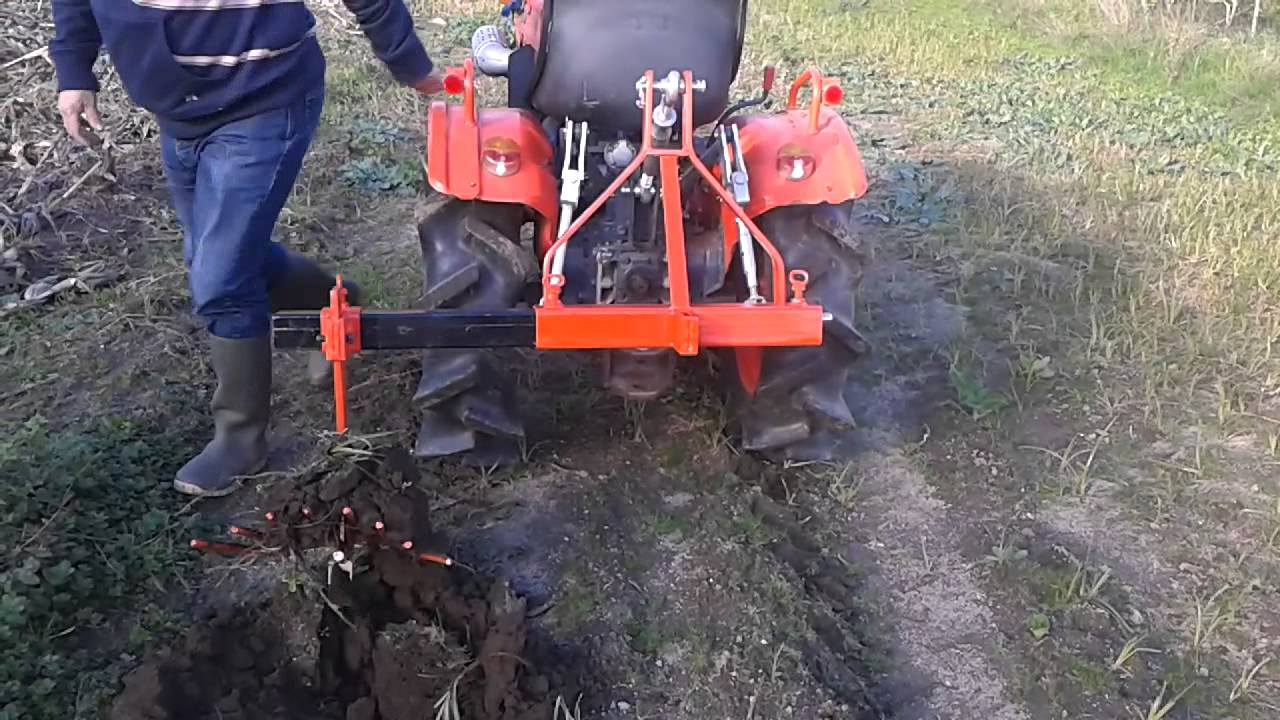 Triangle buttoir multi fonction micro tracteur