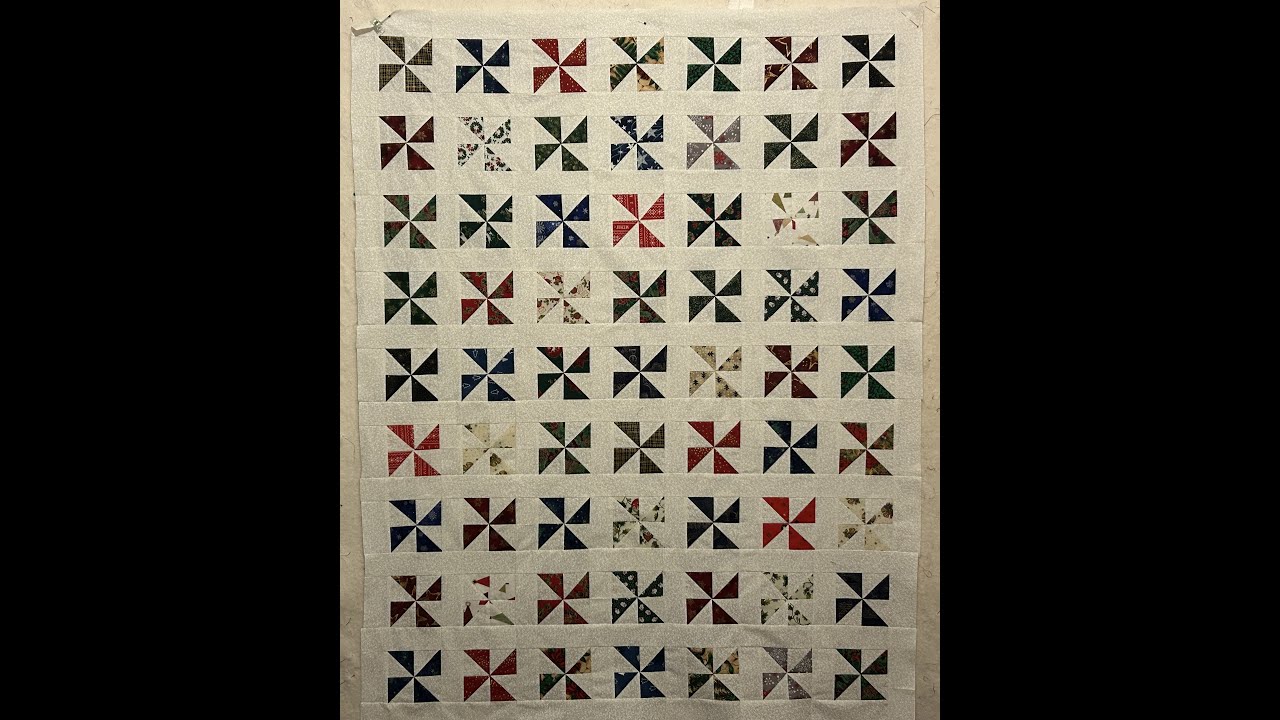 Pinwheel quilt top made with Scrappy Christmas fabric