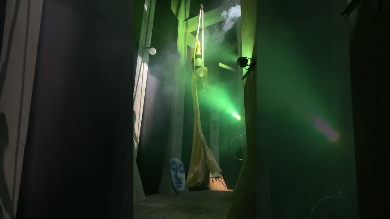 Ambient aerial silks act hip key spin