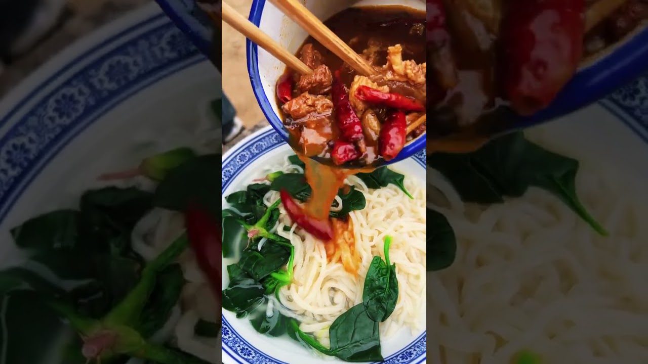 The hand-rolled noodles are chewy and smooth. Drizzled with spicy beef sauce a bowl of bee