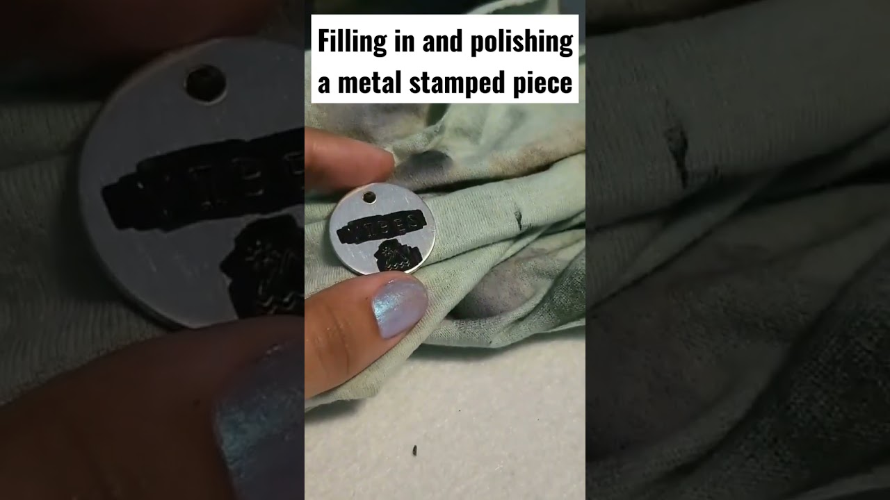 Metal stamping: filling in engraving and polishing. #metalstamping #handengraving #handmadejewelry