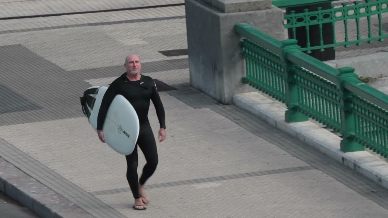 Surfing after big storm in San Sebastian