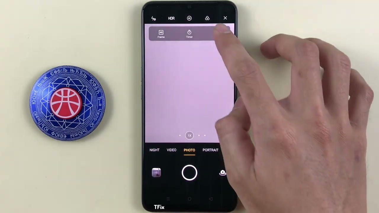 Коснитесь экрана, чтобы сделать снимок в приложении камеры на OPPO A73 под управлением Android 10.