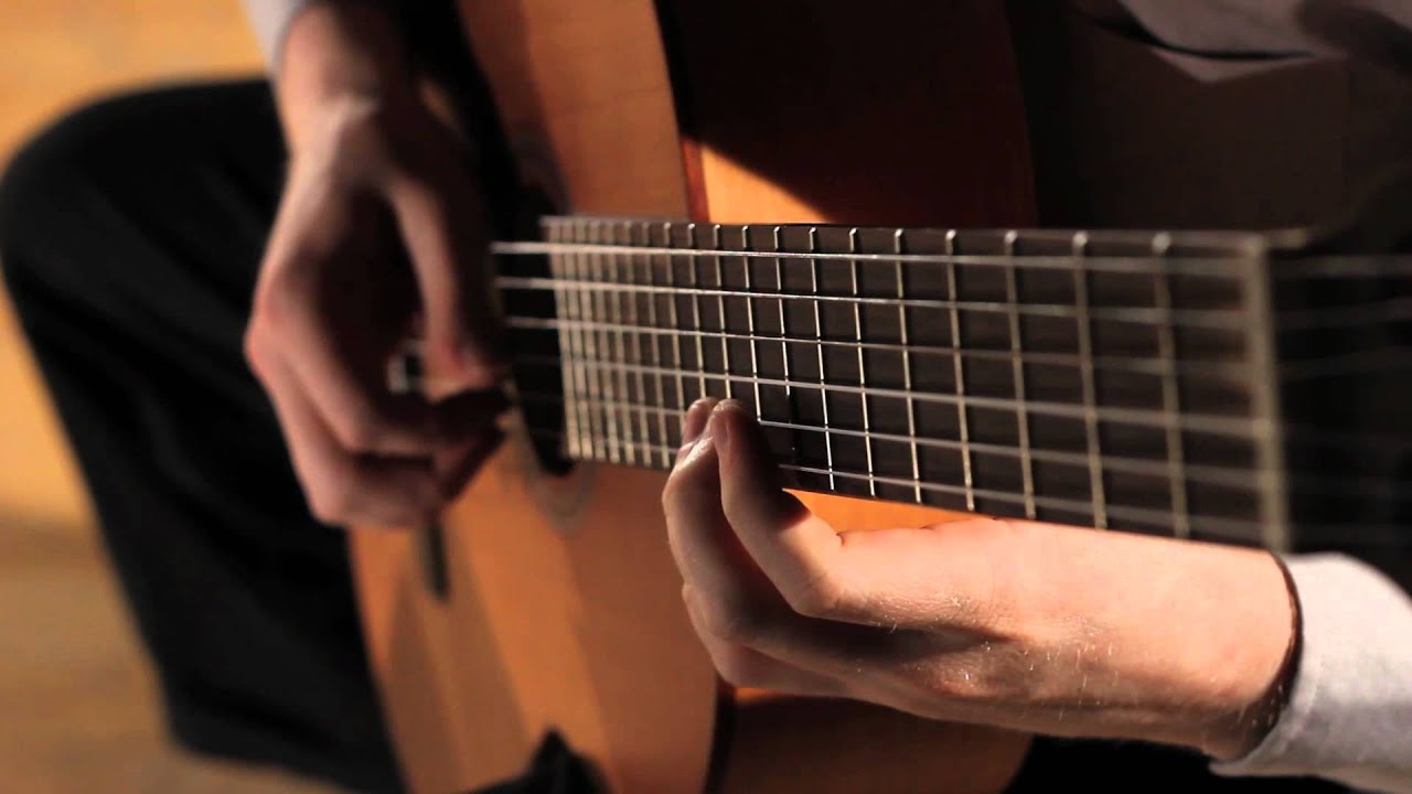 Mozart's Sonata for Two Pianos in D major, K. 448 arranged for Guitar Quartet