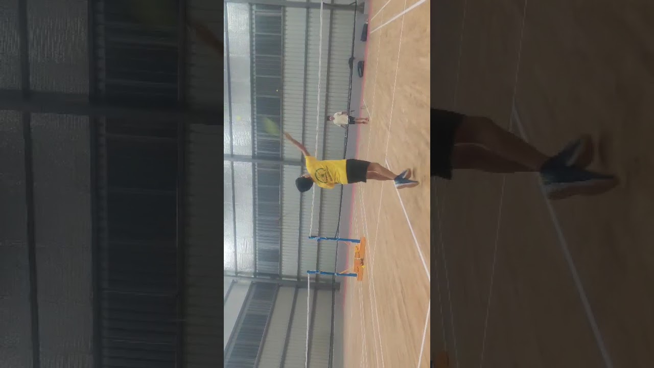I am in my badminton academy this is my match