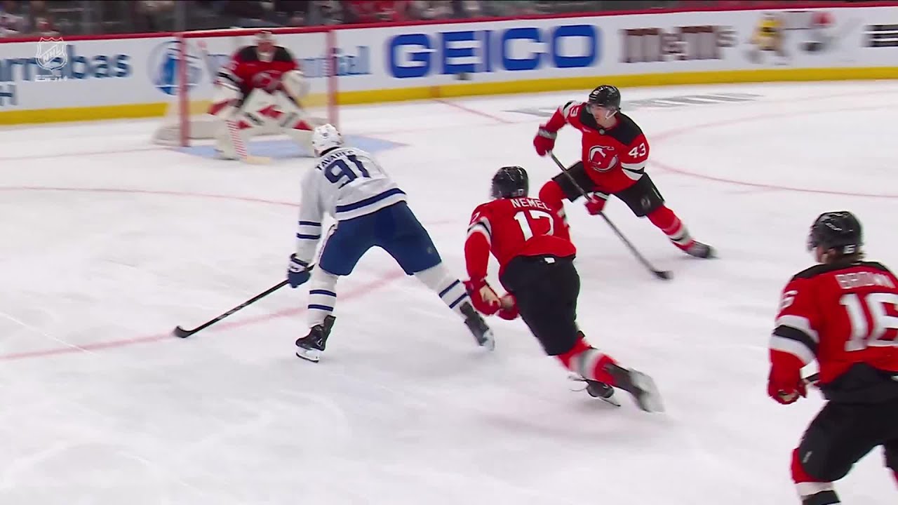 John Tavares scores a goal against the New Jersey Devils