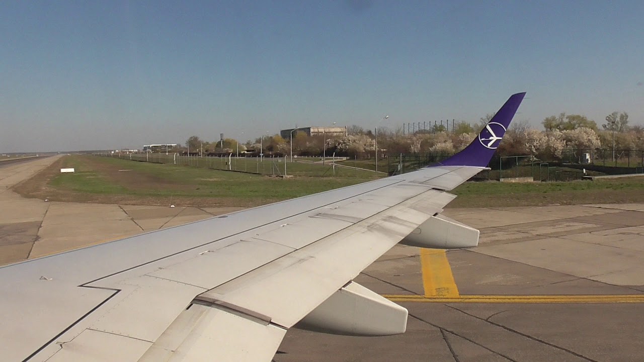 LOT Польские авиалинии Embraer 195 Взлет из Бухареста (LO642)