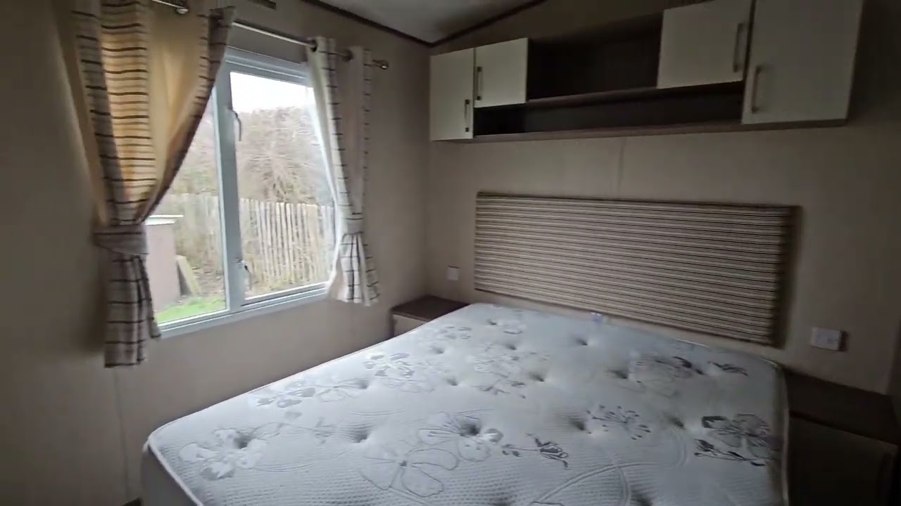 STATIC CARAVAN FOR SALE SITED WITH A DECKING IN INGOLDMELLS BLUE ANCHOR LEISURE 