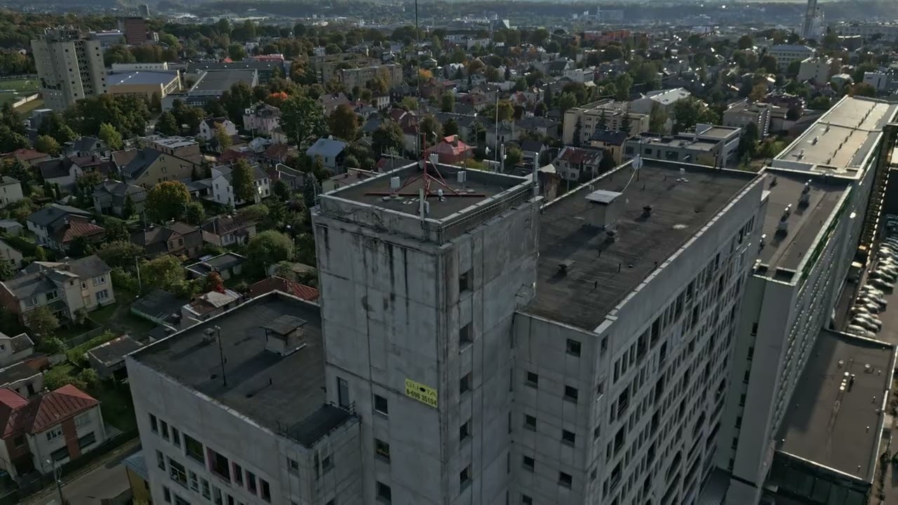 DJI Mini 3 Pro drone flight around Kaunas city buildings (music: penguinmusic - modern chillout)