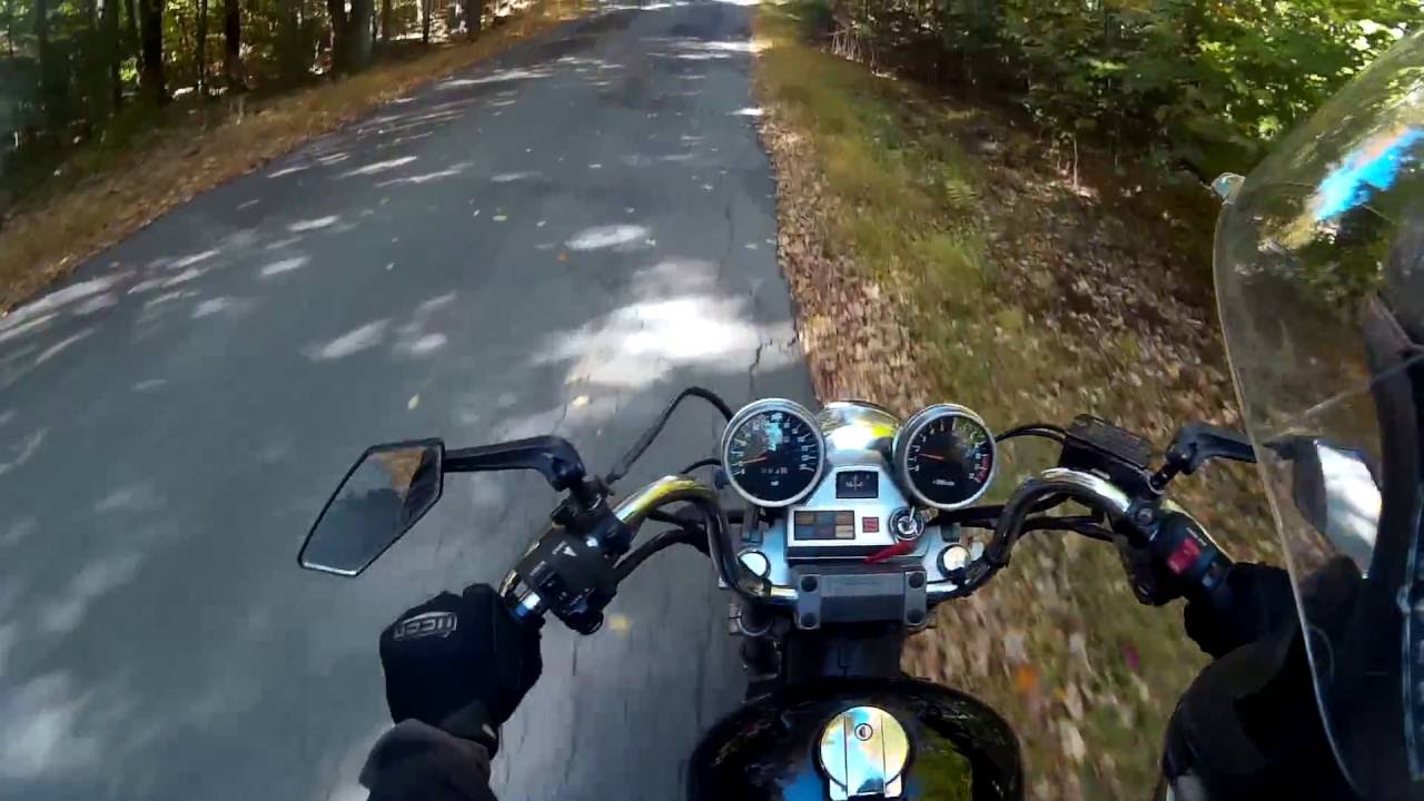 Kawasaki ltd 454 trys to out wheelie a kdx 200