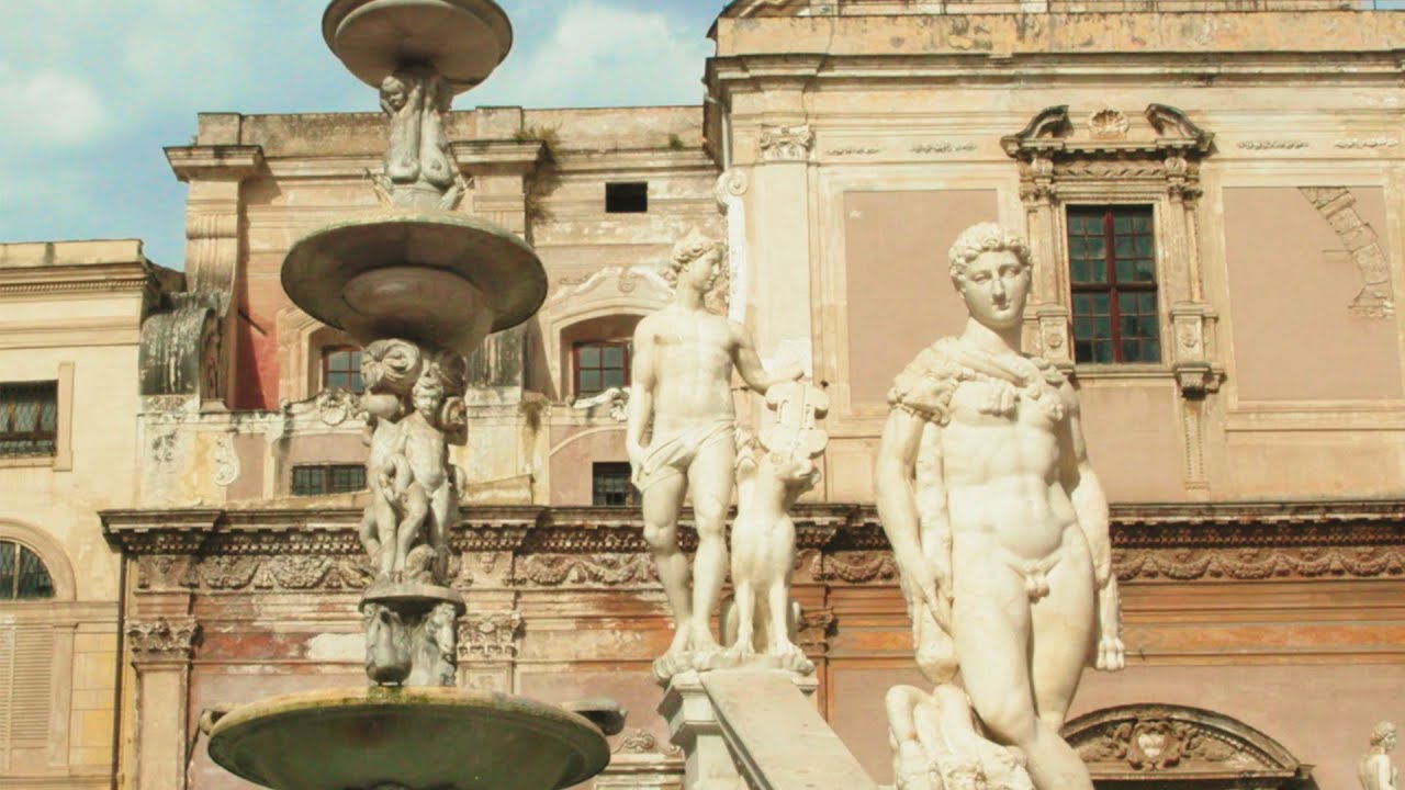 Touring the Sicilian piazzas with “Devotion”