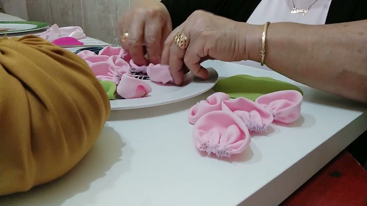Peso de Porta uma flor Rosa.