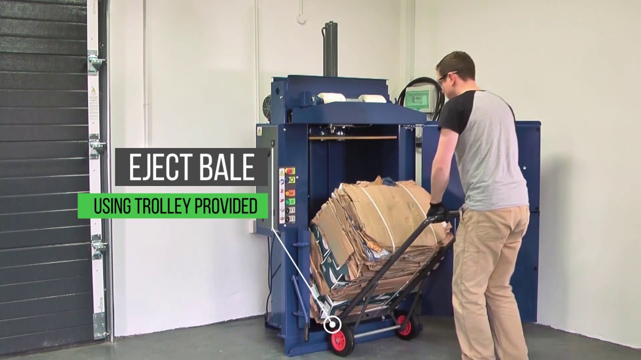 WastePac 60 Auto Vertical Baler making a cardboard bale