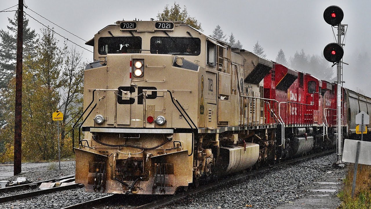 CHASING CP Veterans SD70ACu 7021 LEADING CP 602 with UP ES44AC DPU In British Columbia