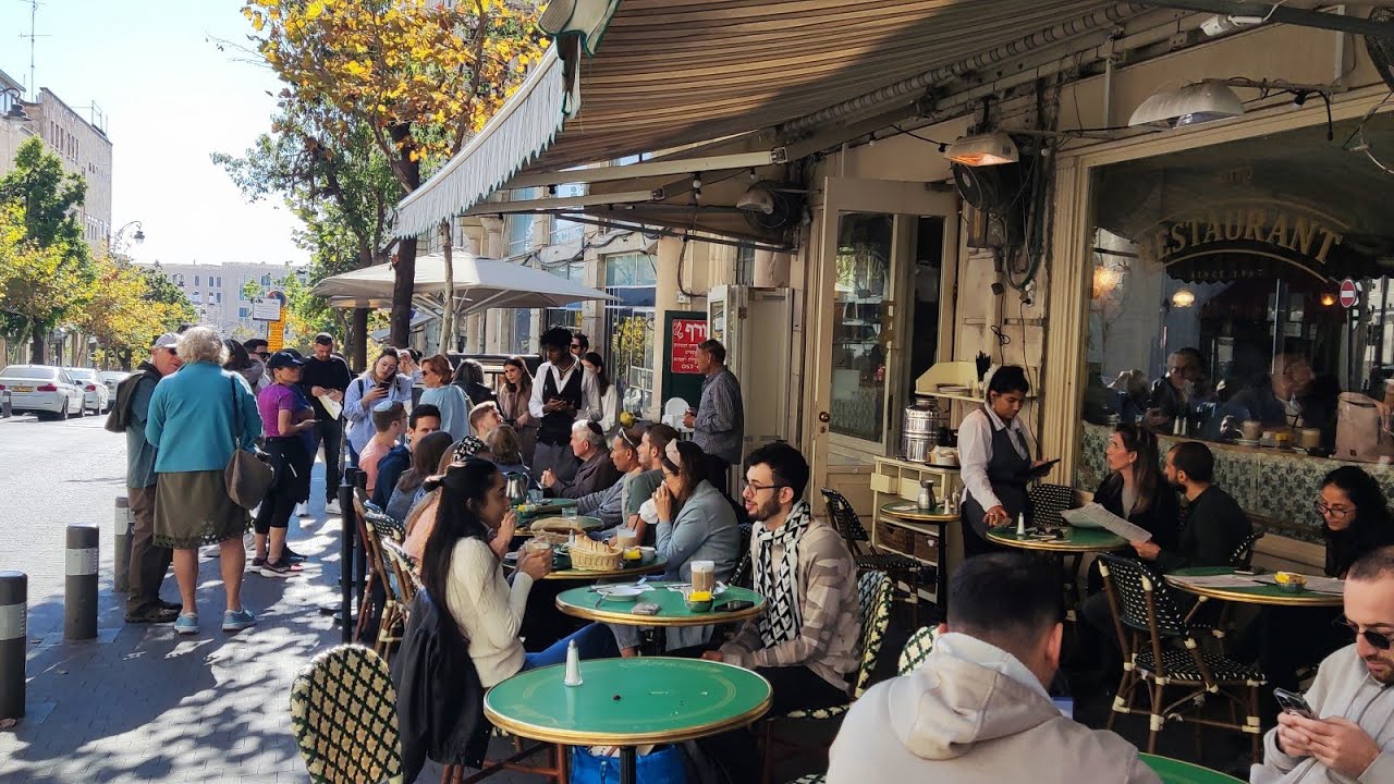 What is going on at famous Cafe Kadosh in Jerusalem Israel on the Morning before Shabbat
