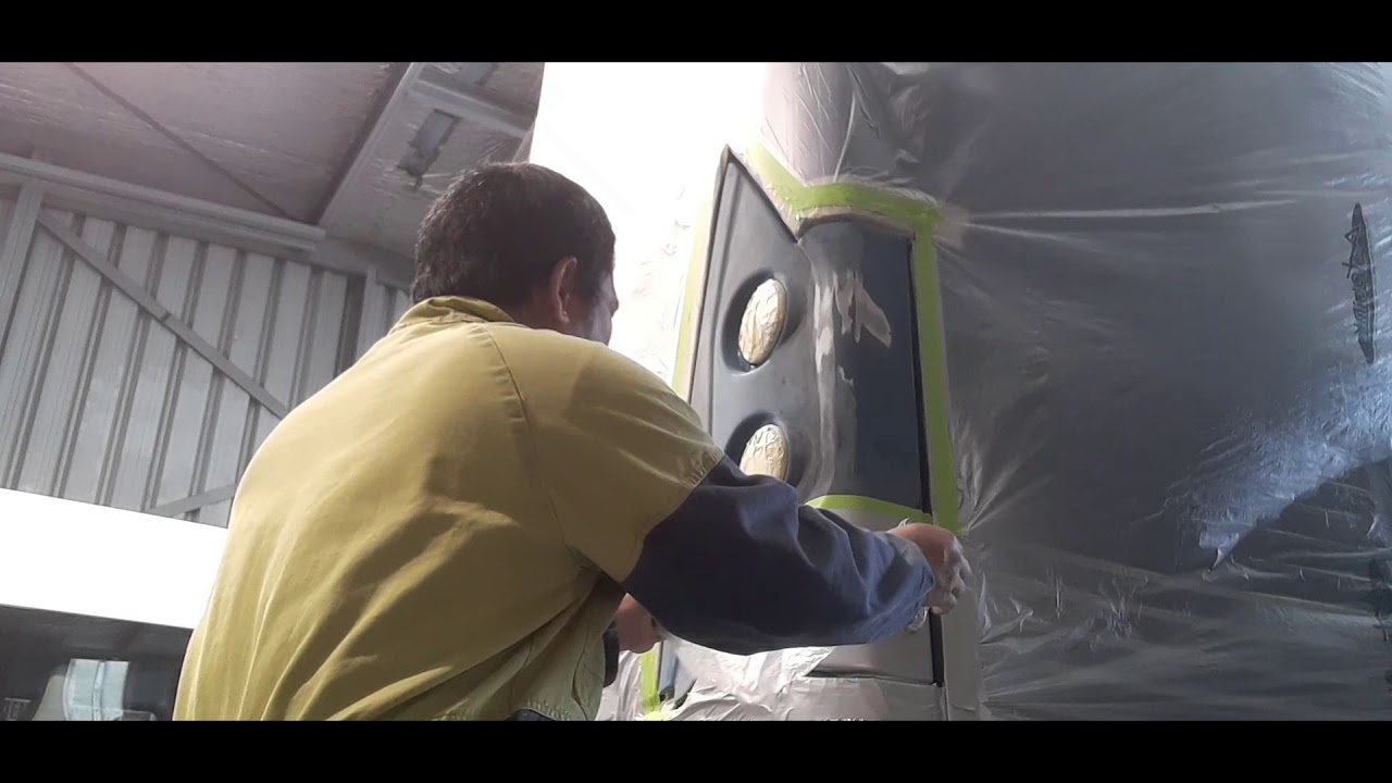 REPAINT RH REAR CORNER ON THE ADL BUS