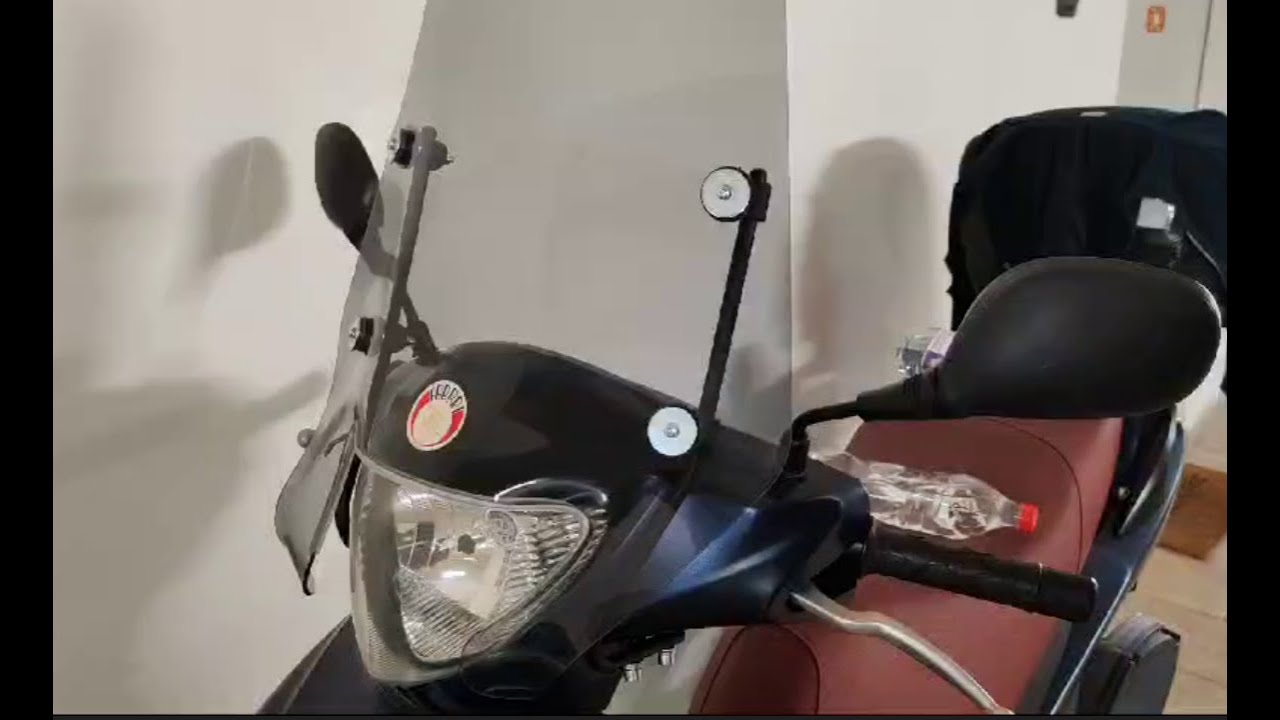 montaggio cupolino su Suzuki Sixteen 150