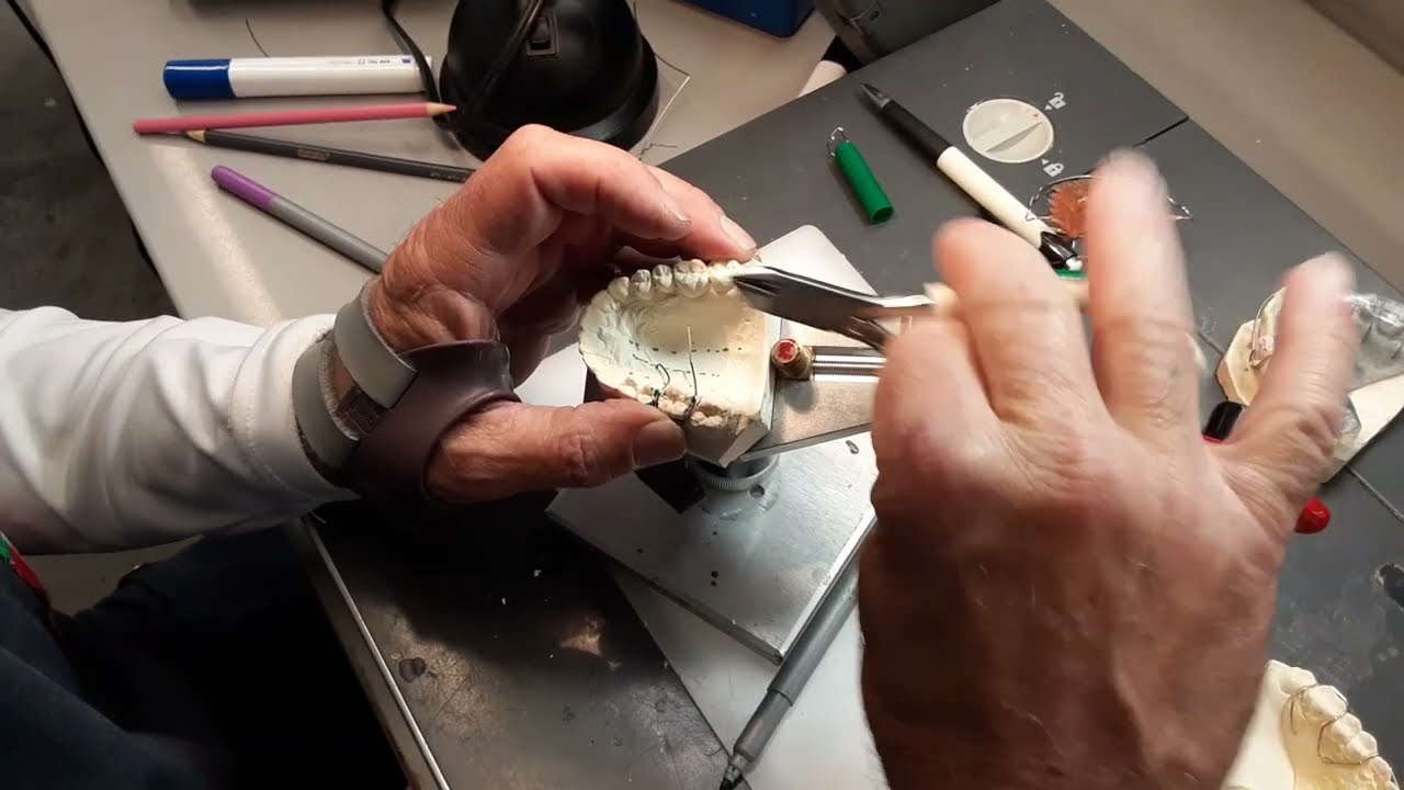 Bending Adams Clasp